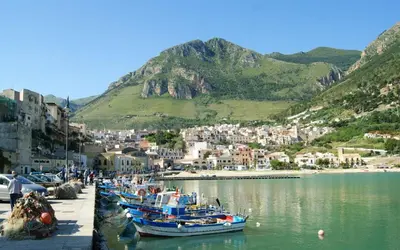 a group of boats docked in a body of water at La Chiusa Case Vacanze in Castellammare del Golfo