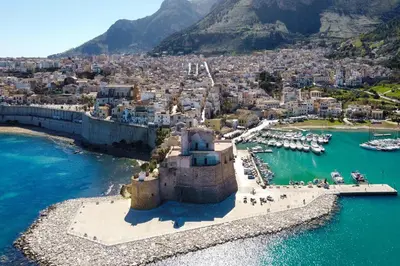 an aerial view of a city with boats in the water at Borgo Aranci - Villetta a schiera Lavanda - A8 in Castellammare del Golfo