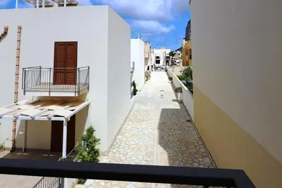 a view of an alley between two buildings at CASA 
