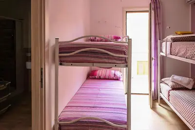 a couple of bunk beds in a room at CASA 