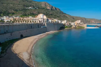 an aerial view of a beach next to the water at Borgo Aranci - Villetta a Schiera A1 in Castellammare del Golfo