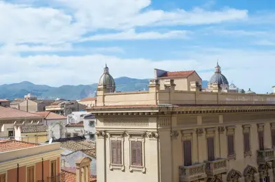 a view of a building with domes on top of it at Aria Rooms in Palermo