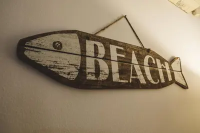 a sign that reads deadlandaiden hanging on a wall at LuminHouse Mondello Zibibbo in Mondello