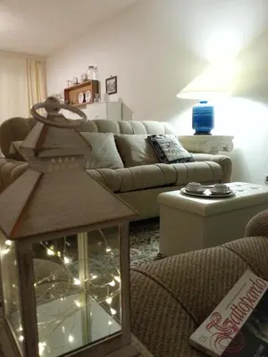 a living room with a couch and a table at Casa dolce Casa in Sambuca di Sicilia
