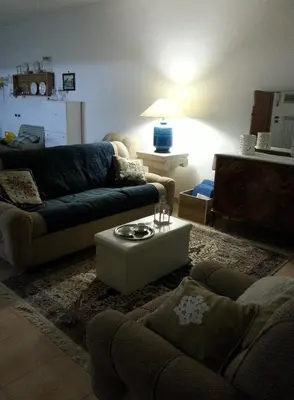 a living room with two couches and a coffee table at Casa dolce Casa in Sambuca di Sicilia