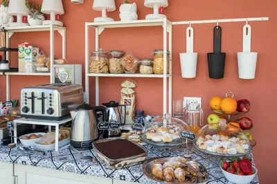 a kitchen counter with food on top of it at Ciccio Rooms and breakfast - Self check-in in Palermo