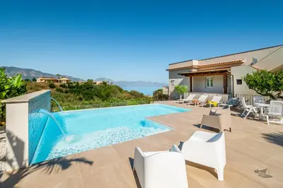 a villa with a swimming pool and a house at Villa DellAcqua in Alcamo Marina