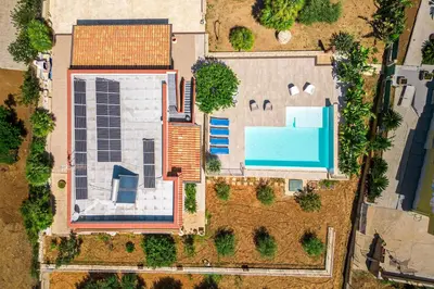 an overhead view of a house with a swimming pool at Villa DellAcqua in Alcamo Marina