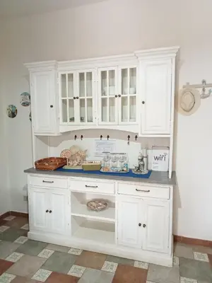 a white cabinet with a counter in a room at VILLA TREROSE by Trerose Properties - Villa centrale con wi-fi e posto auto privato gratuiti in San Vito lo Capo
