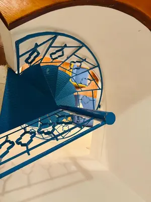 a stained glass window on the side of a boat at La maison sul mare in San Vito lo Capo
