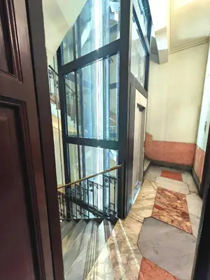 a hallway of a building with a glass door at Casa Ina Palermo in Palermo