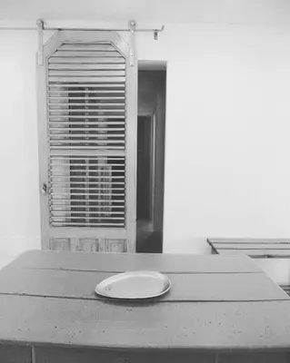 a frisbee sitting on a table in front of a window at Casa Calendule in Alcamo Marina