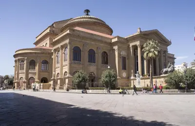 a large building with people walking in front of it at Kalatfimi b&b in Palermo