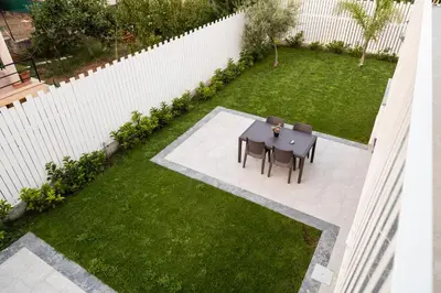 an overhead view of a garden with a table and chairs at Arricàmpati Apartments Villa & Bringo Car Rental in Carini