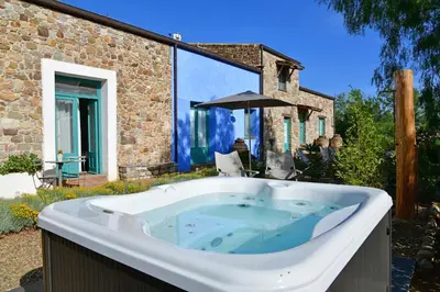 a bath tub in the yard of a house at Terre Di Himera in Buonfornello