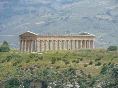 a large building on top of a hill at casa francesca in Castellammare del Golfo