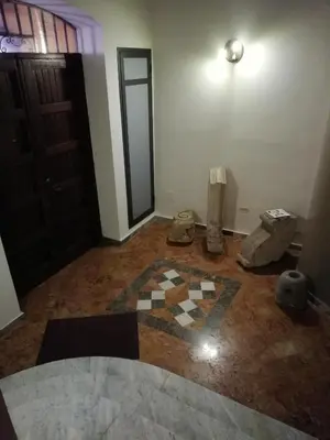 an empty room with a room with a floor and a room at Casa nel Vicolo in Palermo