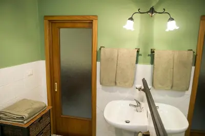 a bathroom with a sink and a toilet and a mirror at B&B Santa Caterina in Palermo