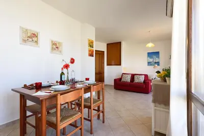 a bathroom with a sink and a toilet and a shower at La Rossa ai Tre Bagli in San Vito lo Capo