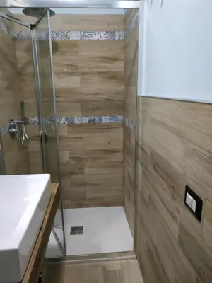 a bathroom with a shower and a sink at Alla Casetta in Palermo