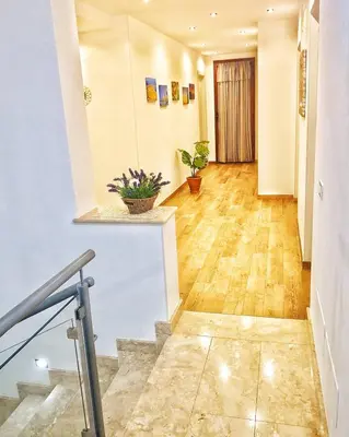 a hallway with a staircase in a building at B&B Vivere San Vito Lo Capo in San Vito lo Capo