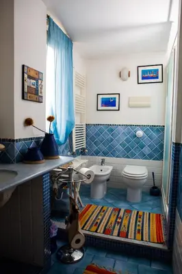 a bathroom with a toilet and a sink at Incantevole E A Due Passi Dal Centro in Palermo