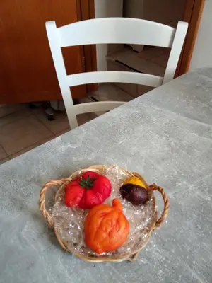 a basket of fruit sitting on top of a table at Porta Nuove Vacanze in Palermo