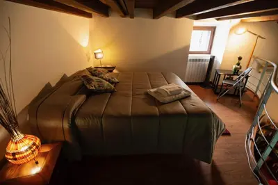 a bedroom with a large bed in a room at Vista Cattedrale in Palermo