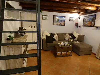 a living room with a couch and a table at Casa Sicana in Palermo