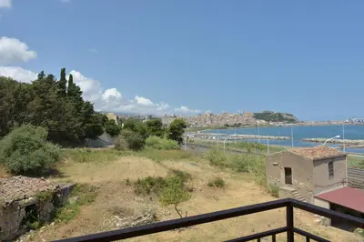 a view of the water from the balcony of a house at Dependance La Mouette in Termini Imerese