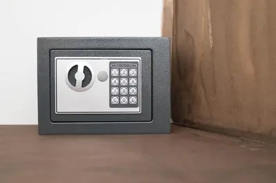 a small safe sitting on top of a floor at Cannatella's Mansion in Palermo