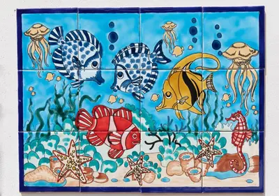 a tile wall with different types of fish at Fuga Romantica vicino al Mare - Rental BeB in Balestrate