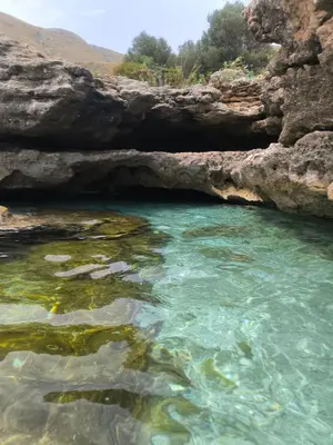 a pool of water in a rock cave at Casa Trinita in Castellammare del Golfo