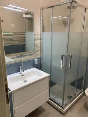 a bathroom with a sink and a shower at Casa Del Mulino a Vento in San Vito lo Capo