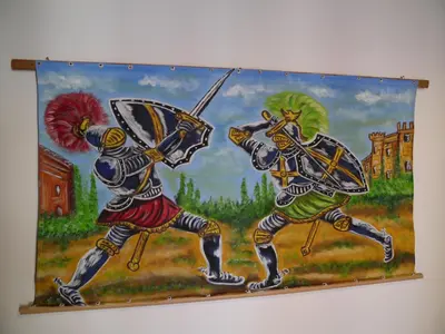 a painting on a wall of two men playingarmor at A Vanedda in Termini Imerese