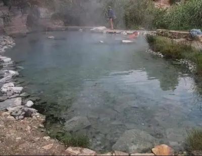 a person standing in a pool of water at Casa Le Bellezze del Golfo in Castellammare del Golfo
