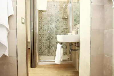 a bathroom with a sink and a shower at Ninni e Fede in San Vito lo Capo