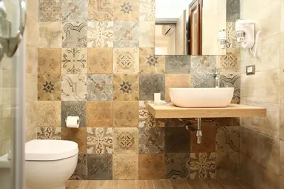 a bathroom with a sink and a toilet at Ninni e Fede in San Vito lo Capo