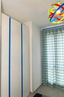 a room with white walls and a window at Casa Vacanze Fontana in San Vito lo Capo