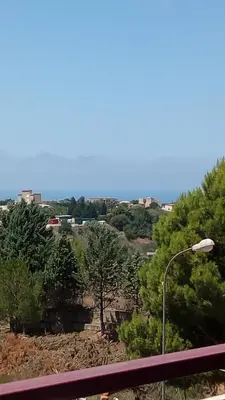 a street light and trees on a hill at A casa di Elena in Alcamo
