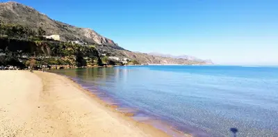 a view of a beach next to the ocean at Casa Mariú in Castellammare del Golfo