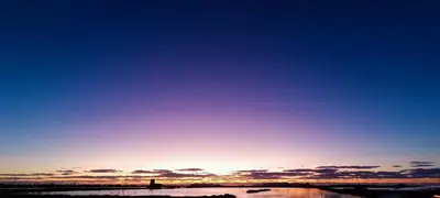 a sunset over a body of water at Casa Mariú in Castellammare del Golfo