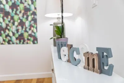 a shelf with a sign that says beta in a room at Sweet Roma 315 in Palermo