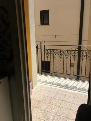 a view of a balcony with a black fence at Casa Vacanze Mannina in Castellammare del Golfo
