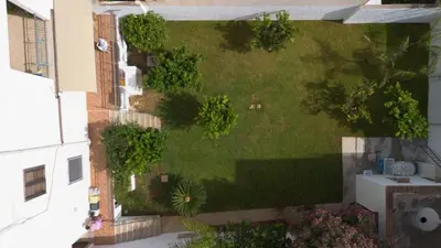an aerial view of a yard with trees and bushes at Casa Lisa a due passi dal mare con ampio giardino in San Vito lo Capo