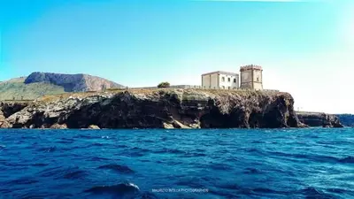 an island in the water with a building on it at GíeffeHOUSE in Terrasini