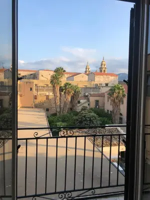 a view of a city from a balcony at Appartamento Valverde in Palermo