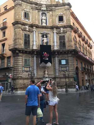 a group of people standing in front of a building at Big Mom House in Palermo