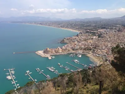 an aerial view of a harbor with boats in the water at Mizzika Vacanze in Castellammare del Golfo