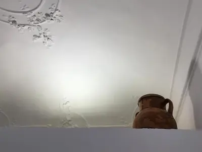 a vase sitting on a shelf in a room at FraLePorte in Palermo